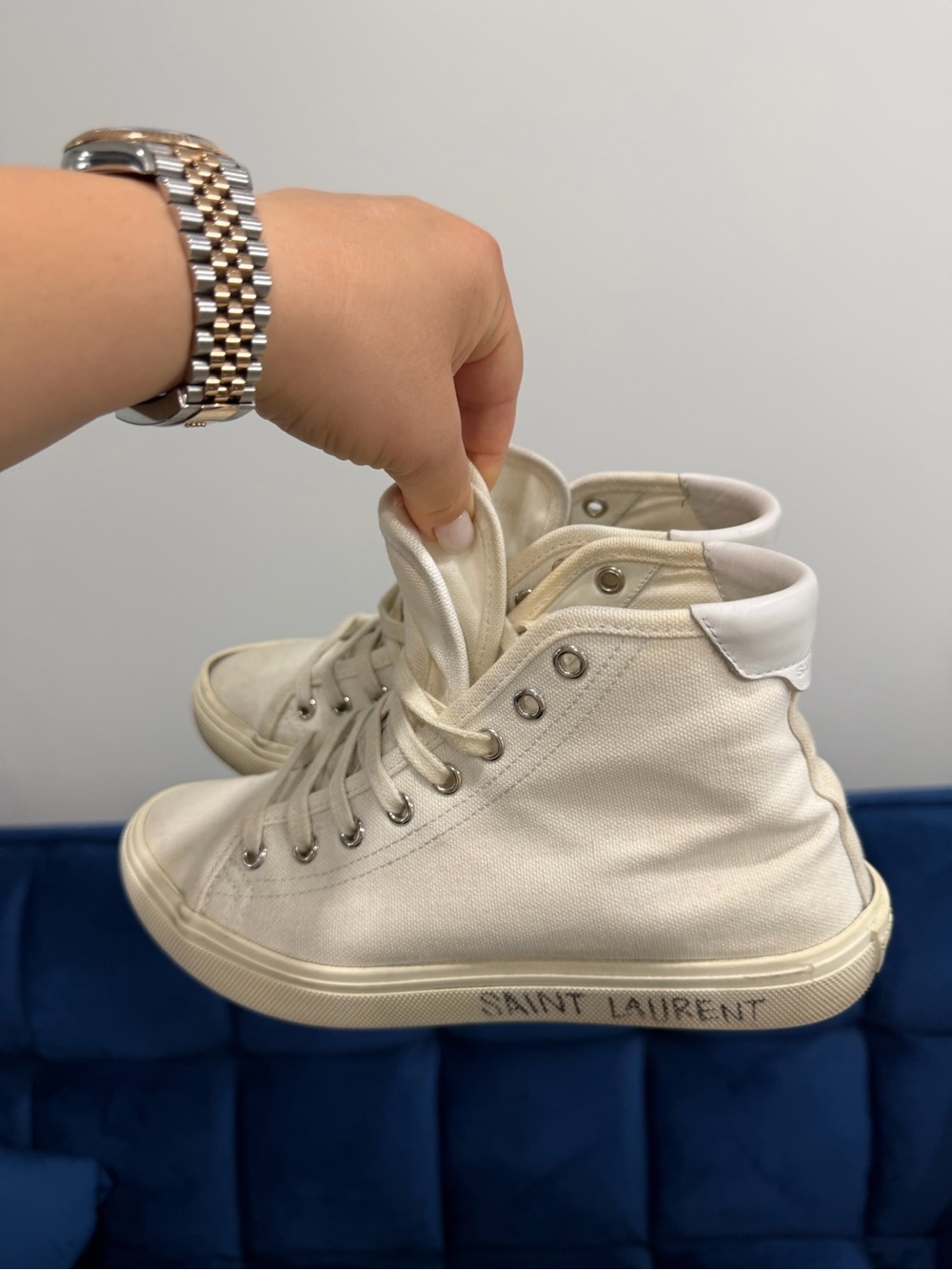 Saint Laurent Off-White High-Top Canvas Sneakers
In good condition